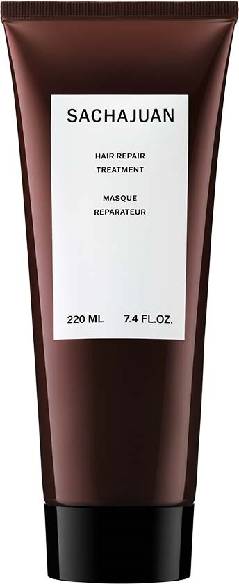 En brun tub märkta Sachajuan Hair Repair Treatment, 220 ml, med vitt text och svart lock.