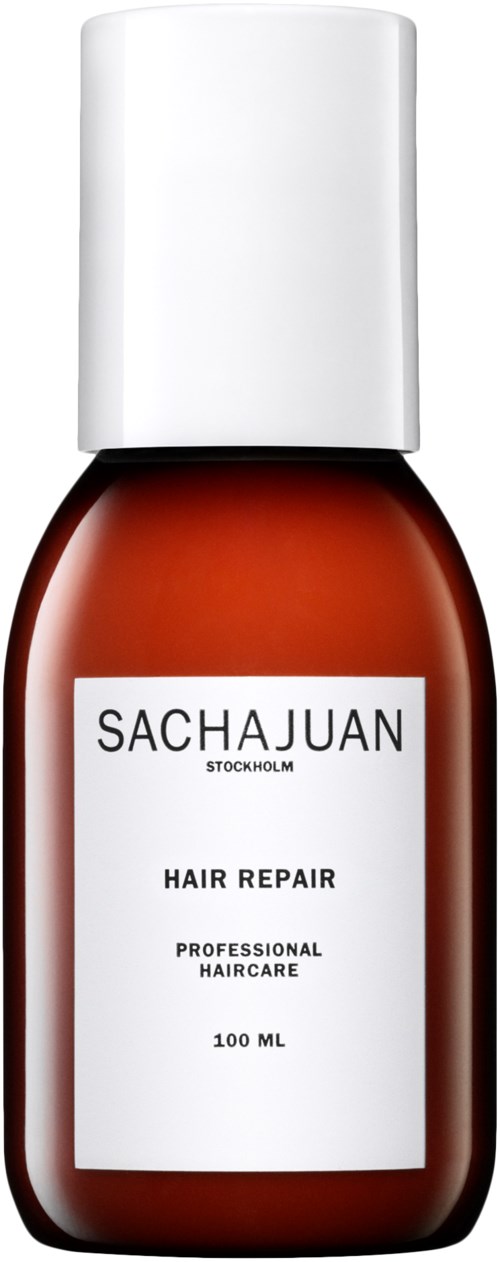 En brun flaska med vit kork. Etiketten visar 'SACHAJUAN, Stockholm, Hair Repair, Professional Haircare, 100 ML.'
