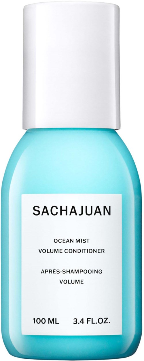 En blå behållare märkt SACHUAAN Ocean Mist Volume Conditioner, 100 ml, med vit topp.