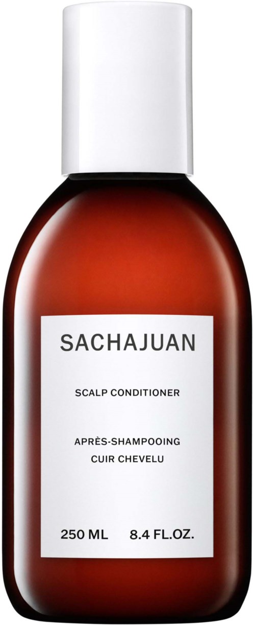 Eine braune Flasche mit weißem Deckel, beschriftet 'SACHAJUAN' und 'scalp conditioner', enthält 250 ml Haarprodukt.
