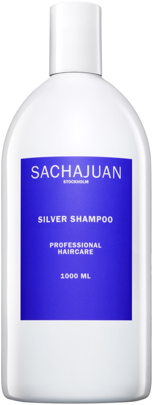 Vit flaska med en blå etikett som säger 'SACHAJUAN', 'SILVER SHAMPOO' och 'PROFESSIONAL HAIRCARE'.