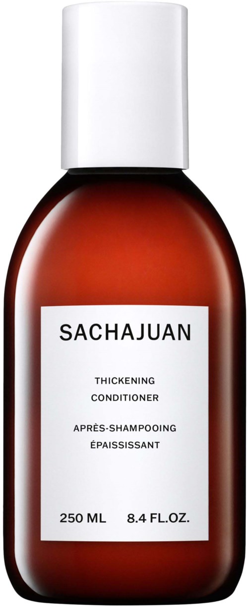 Eine braune Flasche mit weißem Deckel, beschriftet mit 'SACHAJUAN' für Haarconditioner. 250 ml.