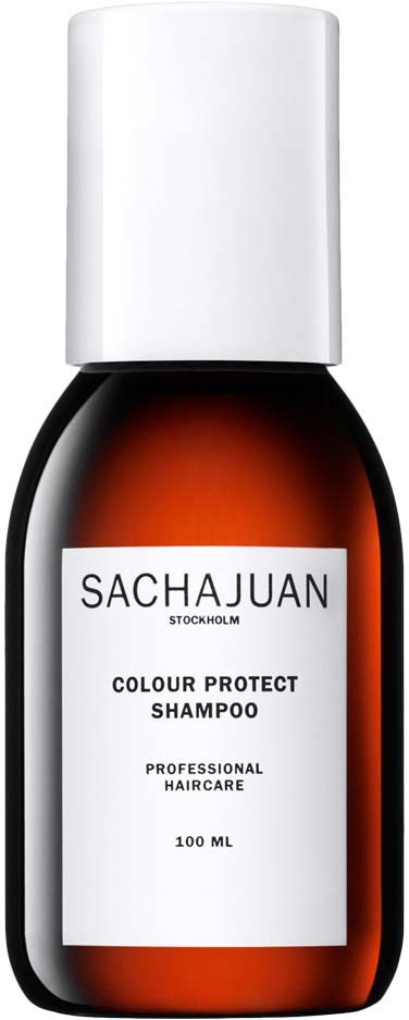 En liten, brun flaska med vit kork märkt 'SACHAJUAN Colour Protect Shampoo'.