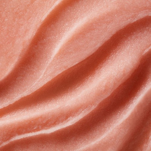 Nahaufnahme einer rosa, glatten, gerippten Oberfläche, möglicherweise Haut oder Stoff. Keine anderen Objekte sichtbar.