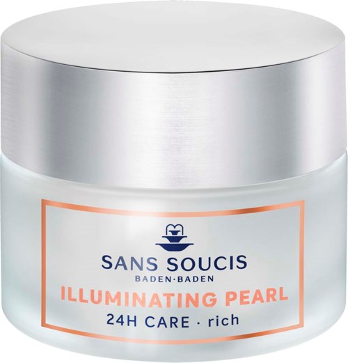 A white jar with a silver lid, labeled 'Illuminating Pearl,' offers 24-hour moisturizing skincare.