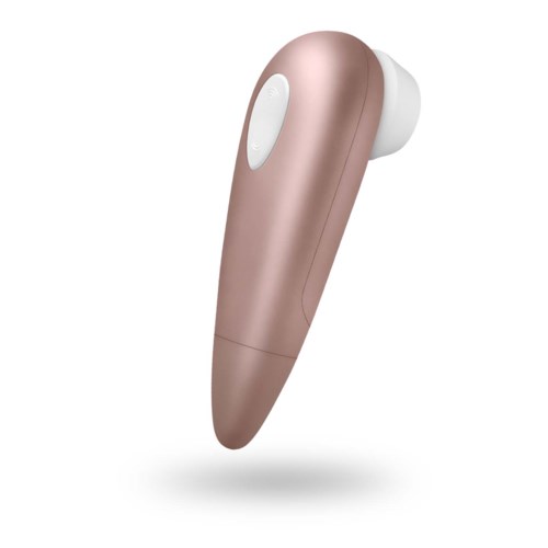 A wireless earbud with a white button and a sleek, pinkish-brown design.