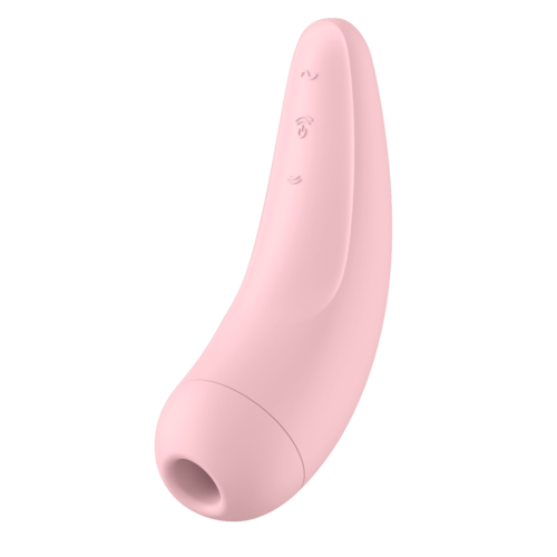 A pink, curved device with small face-like drawings and a hole at the bottom, resembling a cartoon character.