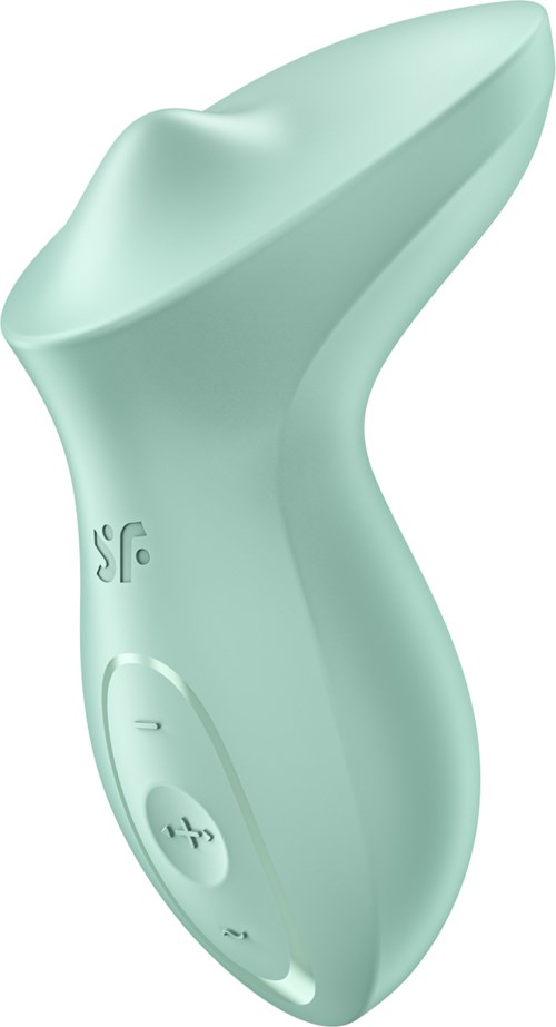 A soft green device with a curved shape and buttons, possibly a skincare or facial cleansing tool.