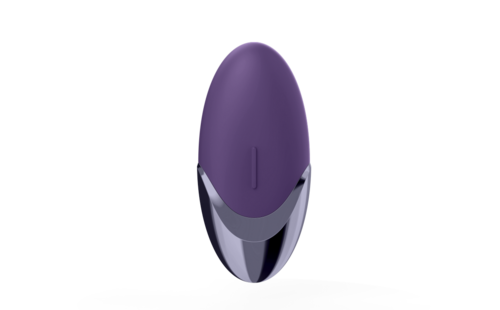 Violetti ja hopea elektroniikkalaite seisoo pinnalla, näyttää tyylikkäältä ja modernilta.