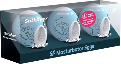 Drei Eier in einer Box mit der Beschriftung 'Masturbator Eggs' und Gesichtslinien sowie einem pinken Label zu wasserbasiertem Gleitmittel.