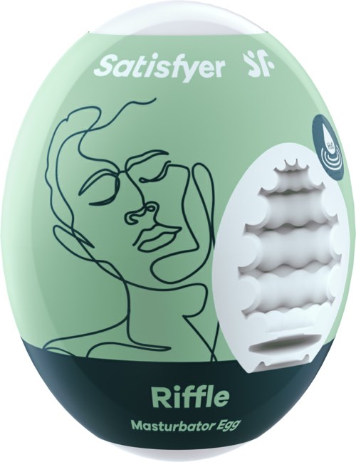 A round container with a drawing of a face and words, showing it holds a masturbator egg called Riffle.