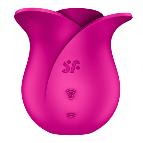 A pink, flower-shaped device with symbols and a wireless charging indicator on it.