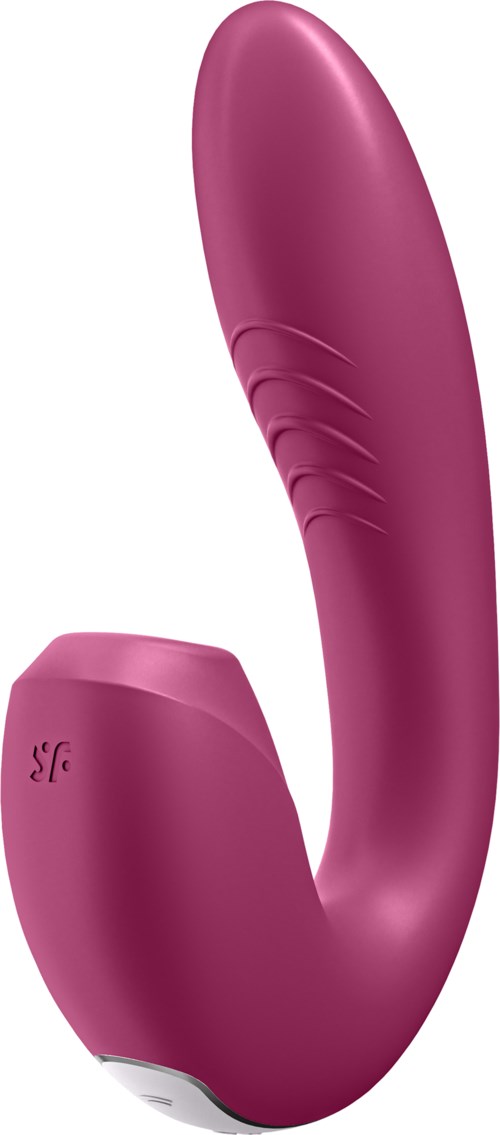 En rosa, kurvad och slät personlighetsvårdsapparat med bas, antagligen en vibrator eller massager.