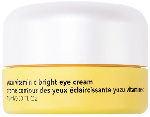Gele deksel met witte van Yuzu Bright Eye Cream, tekst in het Engels en Frans.