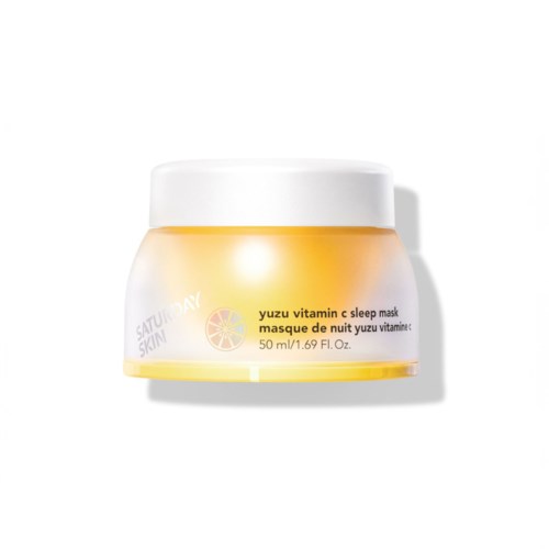 Kleine gele en witte pot met tekst over yuzu vitamine C slaapmasker.