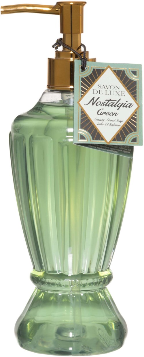 A green liquid soap in a vintage-style glass bottle with a gold pump and a label.