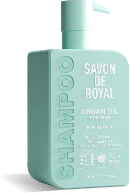 A light green shampoo bottle with a pump, labeled "SAVON DE ROYAL" for hair repair and argan oil.