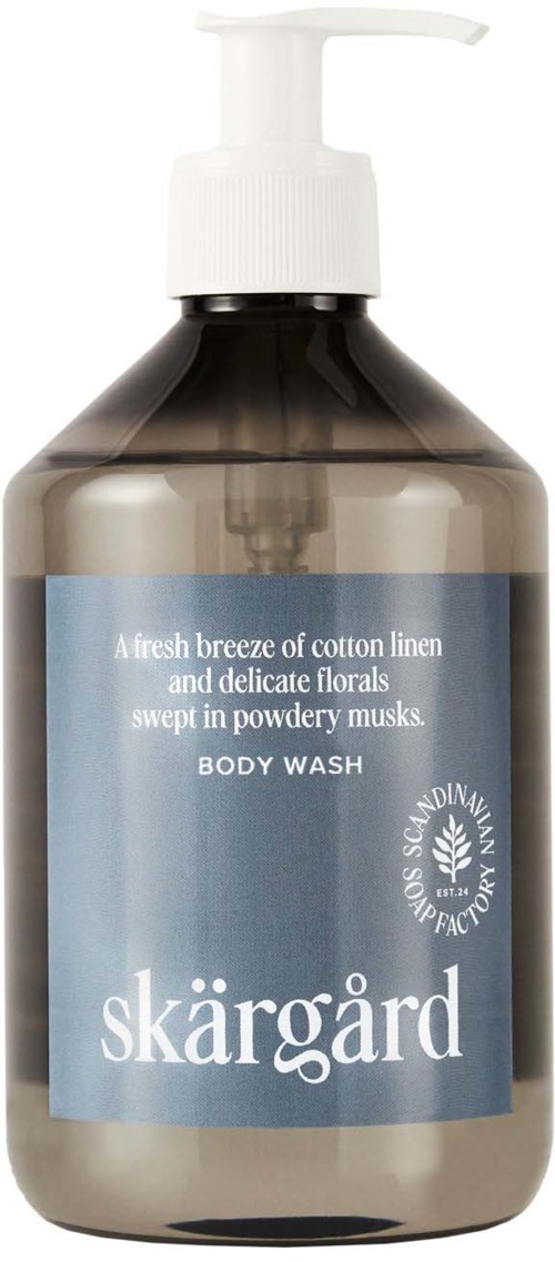 A grey plastic body wash bottle with a pump, labeled 'Skärgård' and mentions cotton linen scent.