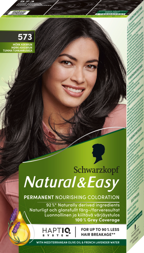 Een doos haarverf met een lachende vrouw met lang zwart haar, merk Schwarzkopf Natural & Easy, nummer 573.