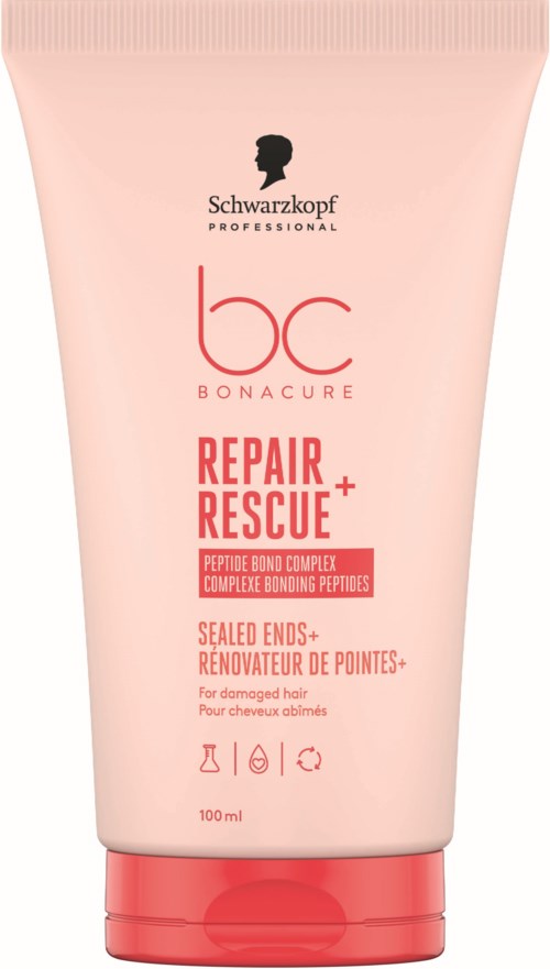 En rosa tub med Schwarzkopf Bonacure Repair Rescue hårbehandling för skadat hår, med röd och svart text och symboler.