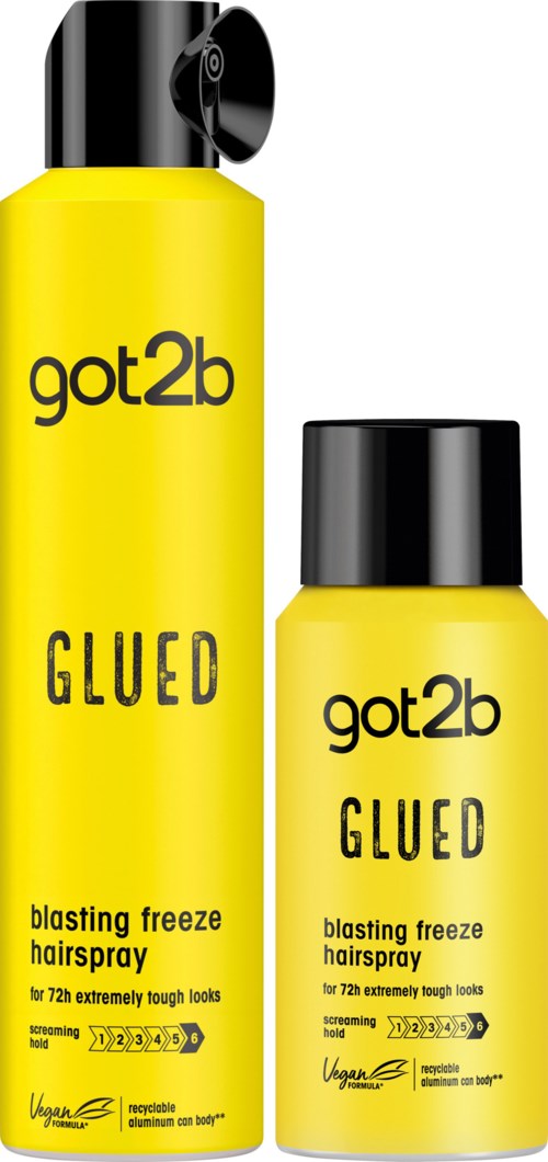 Twee gele flessen met 'got2b GLEED' haarspray voor dik haar. Eén fles heeft een spraydop, de andere een deksel.