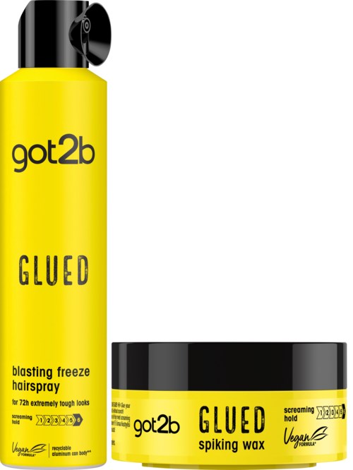 En gul hårsprayflaske og en gul voksbeholder med svarte hetter, merket "got2b" og "GLUED".