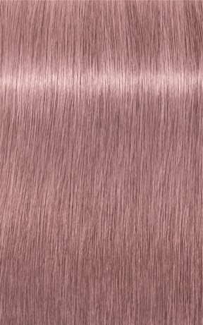 Een close-up van een glanzend, metalen, roségouden oppervlak met fijne verticale lijnen.