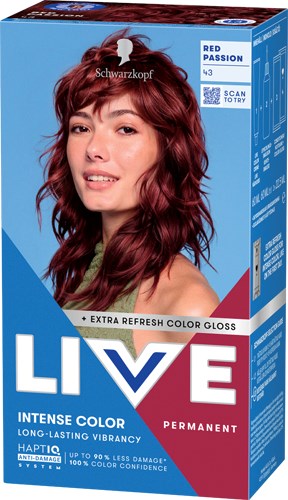 A woman with wavy red hair and a slight smile, holding a hair color box labeled LIVE permanent.