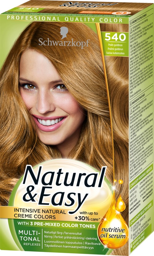 En hårfärgningsförpackning märkt 'Natural & Easy' med en leende kvinna med långt, vågigt, blont hår på sig.