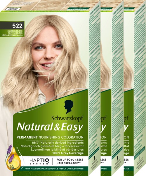 Vier Packungen Schwarzkopf Natural & Easy Haarfarbe mit einem lächelnden Frau auf der Vorderseite. Grüne und weiße Verpackung.