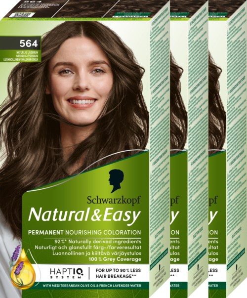 Schwarzkopf Haartönungskartons mit lachender Frau und grüner Beschriftung, Werbung für natürliche, einfache und nährende Haarfarbe.