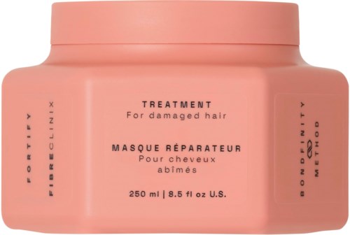 Rosa Behälter mit Haarbehandlung, 250 ml, deutsche Wörter.