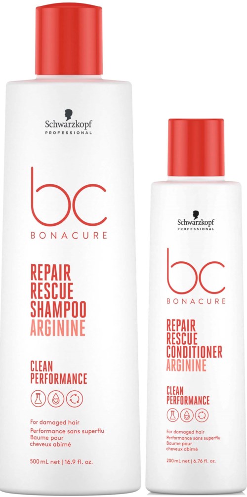 Zwei Flaschen Haarpflegeprodukte, eine große für Shampoo und eine kleine für Conditioner, beide mit roten Verschlüssen.