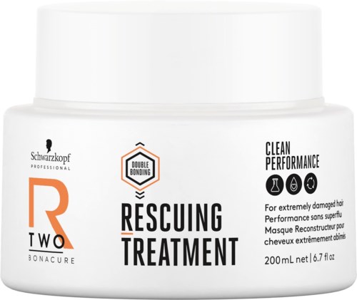 Valkoinen purkki nimeltä Rescuing Treatment vaurioituneille hiuksille, ikoneita osoittamassa hoitoa ja suorituskykyä, 200 ml kapasiteetti.