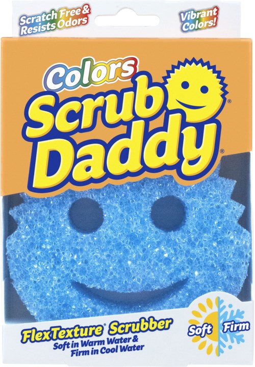Ljusblå rengöringssvamp med leende ansikte, i förpackning märkt Colors Scrub Daddy, mjuk och hård struktur.