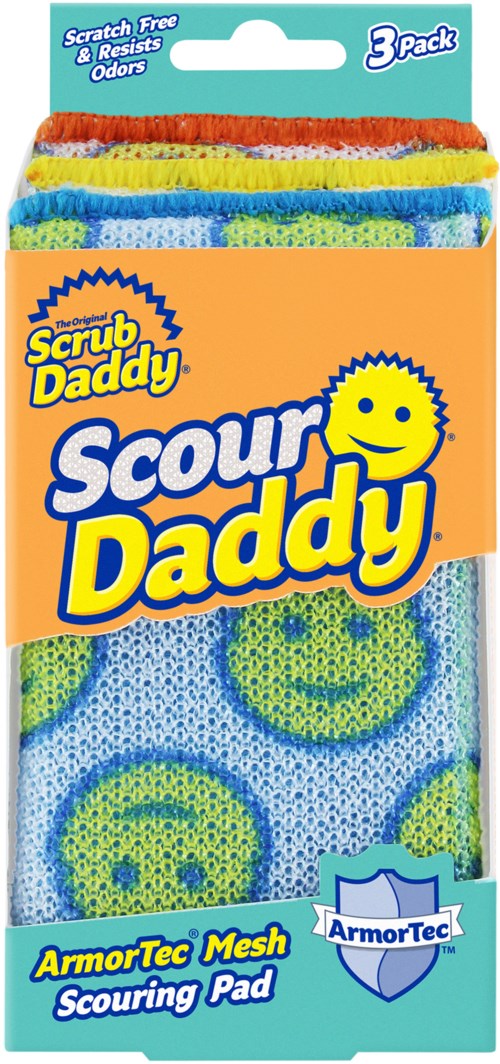 Förpackning med tre färgglada nät-svampdukar med leende ansikten och en sköldlogo, märket Scrub Daddy, för rengöring.