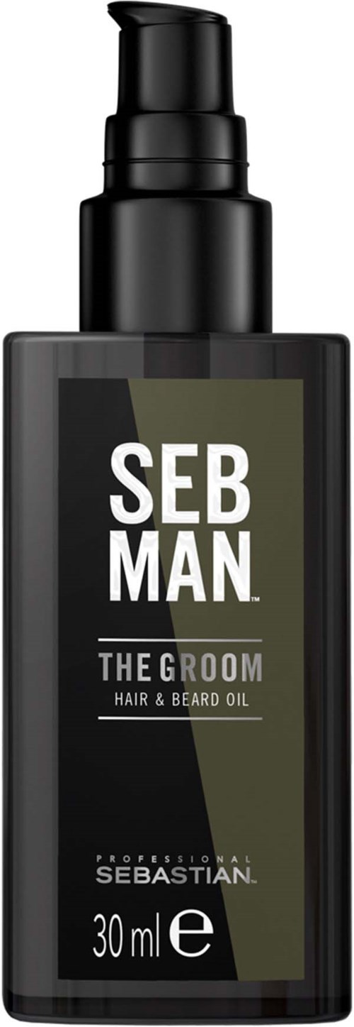 Eine schwarze Flasche mit Pumpe mit der Aufschrift 'SEB MAN THE GROOM Hair & Beard Oil' in Weiß und Grau.