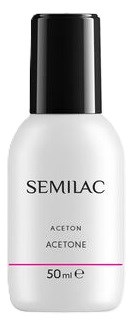En vit nagellackflaska med svart lock. Etiketten säger 'SEMIAC', 'ACETON' och '50 ml'.