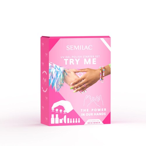 Rosa Box mit Nagellack-Starterset, Hände und bunte Accessoires auf der Vorderseite.