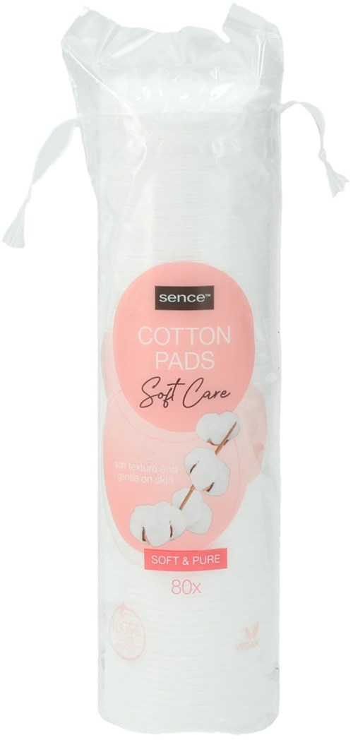 Clear cylindrical package of cotton pads with pink label, tied at the top with strings.