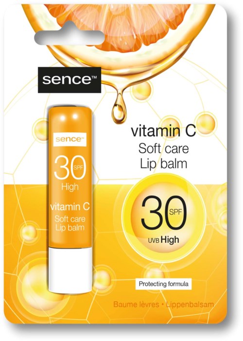 Lippenbalsam mit Vitamin C und SPF 30, schützt und macht die Lippen weich. Gelbes und weißes Verpackungsdesign, Fokus auf hohem UVB-Schutz.