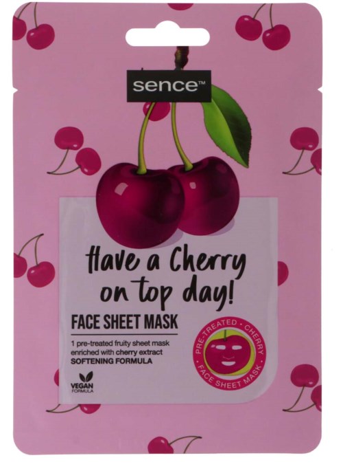 Eine rosa Gesichtsmaske mit Kirschen, sagt "Have a Cherry on Top Day!" und zeigt Kirschbilder und ein lachendes Gesicht.