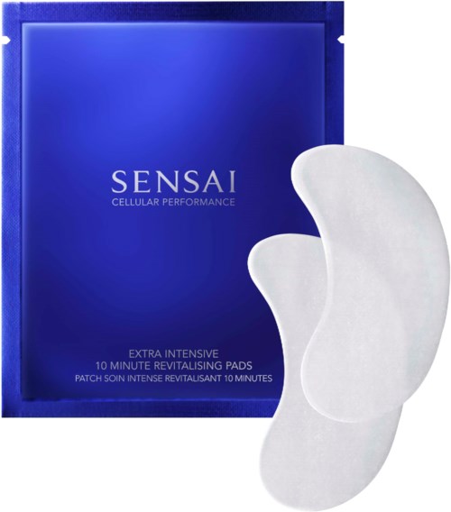 Eine Box mit "Sensai" und zwei weiße, gebogene Hautpads daneben.