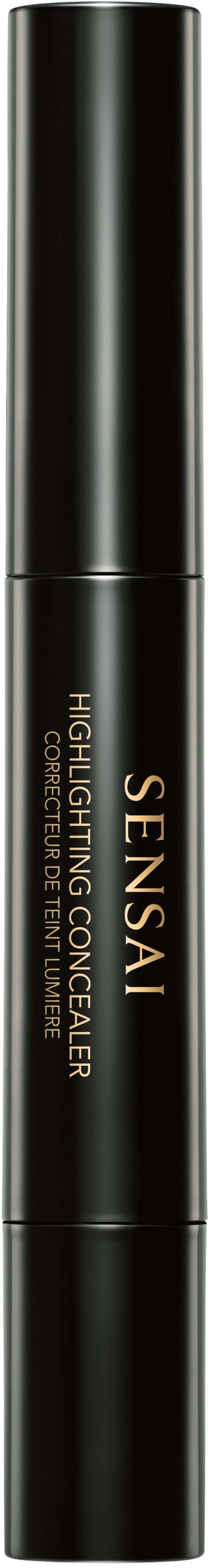 A black cylindrical tube with gold text for a skincare product, labeled as 'SENSAI HIGH PERFORMANCE MOISTURIZING CONCEALER.'