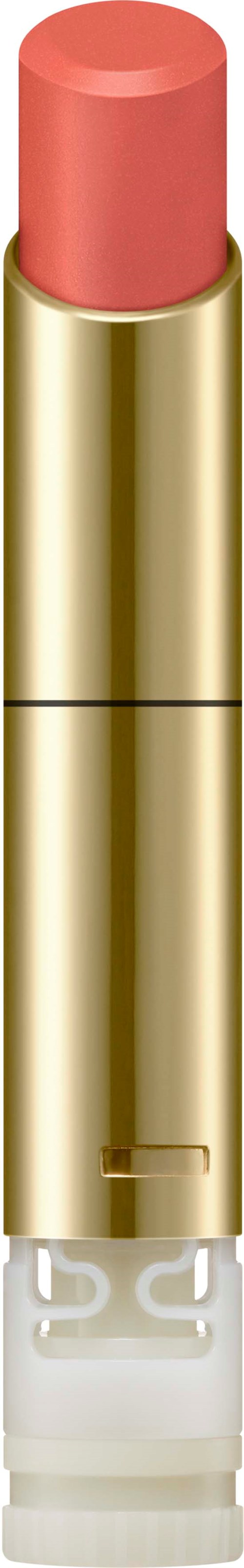 Ein Lippenstift in pinkem Farbton in goldenem Behälter.