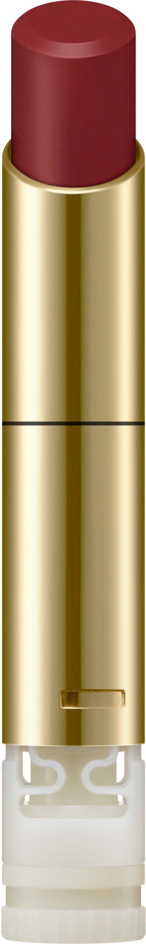 Ein Lippenstift in goldener Hülle mit roter Farbe und transparentem Boden.