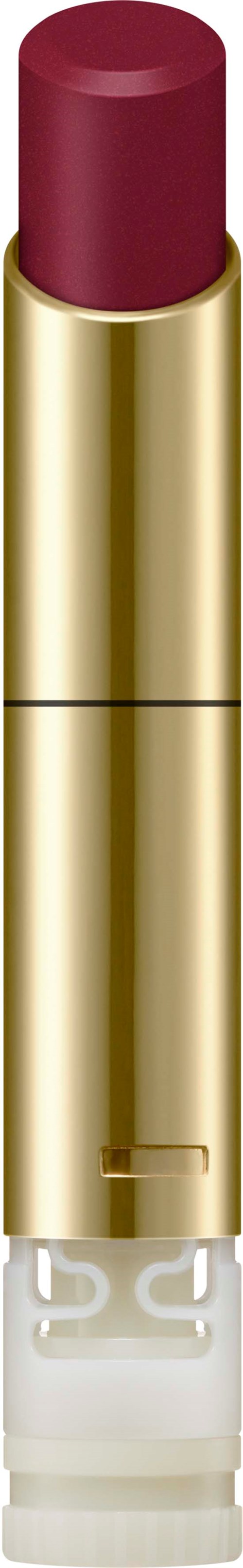 Ein Lippenstift mit roter Farbe in einem goldenen Zylinder.