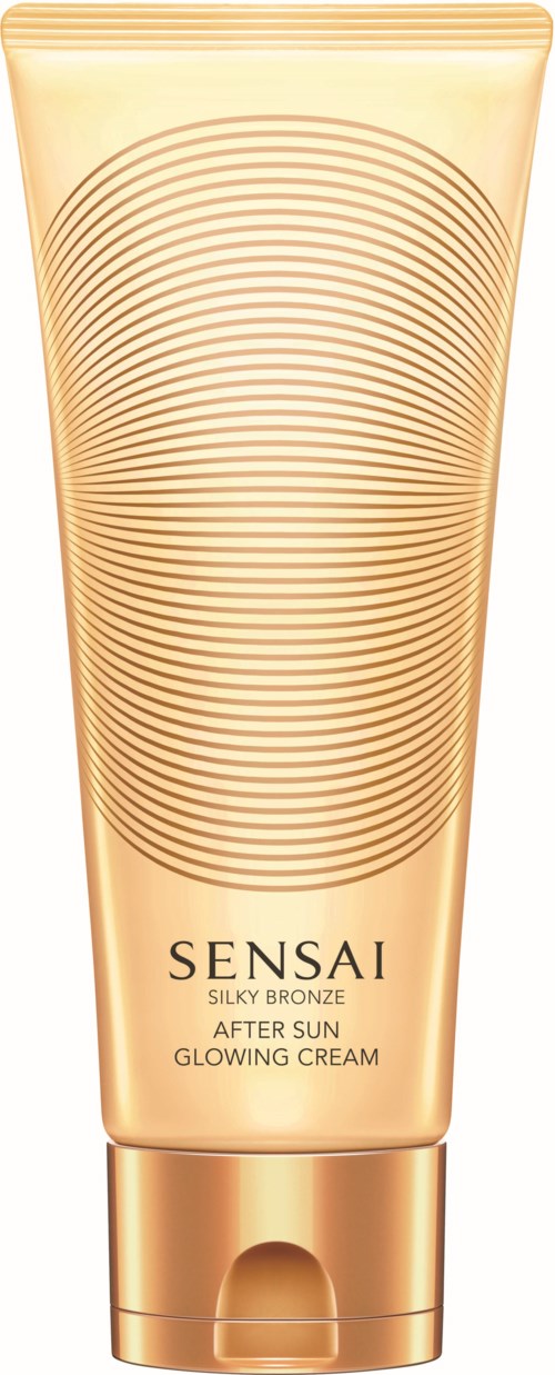 A gold-colored tube labeled Sensai Silky Bronze After Sun Glowing Cream, with concentric circle design.