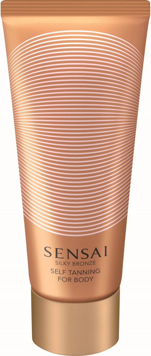 Een goudkleurige zelfbruiningscrème tube met witte spirallijnen en zwarte tekst, gemarkeerd 'Sensai Silky Bronze' voor lichaam.