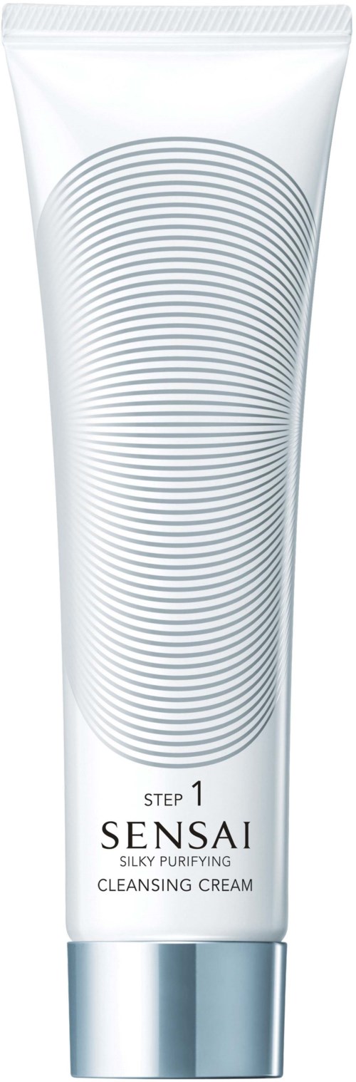 Een witte tube met label 'Sensai Silky Purifying Cleansing Cream' en concentrische cirkels, die een huidverzorgingsproduct aangeven.